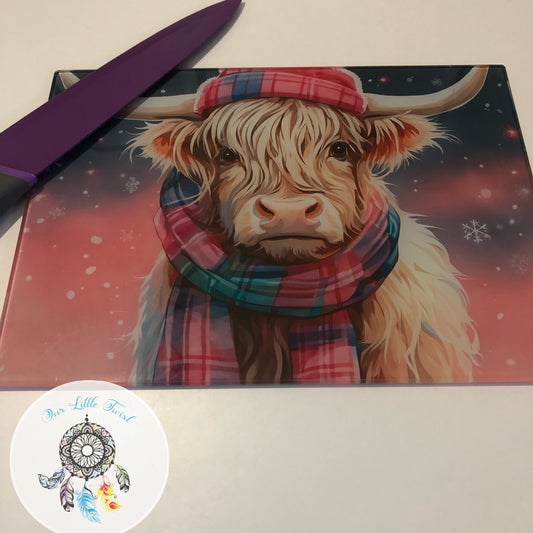 Winter highland cow chopping board